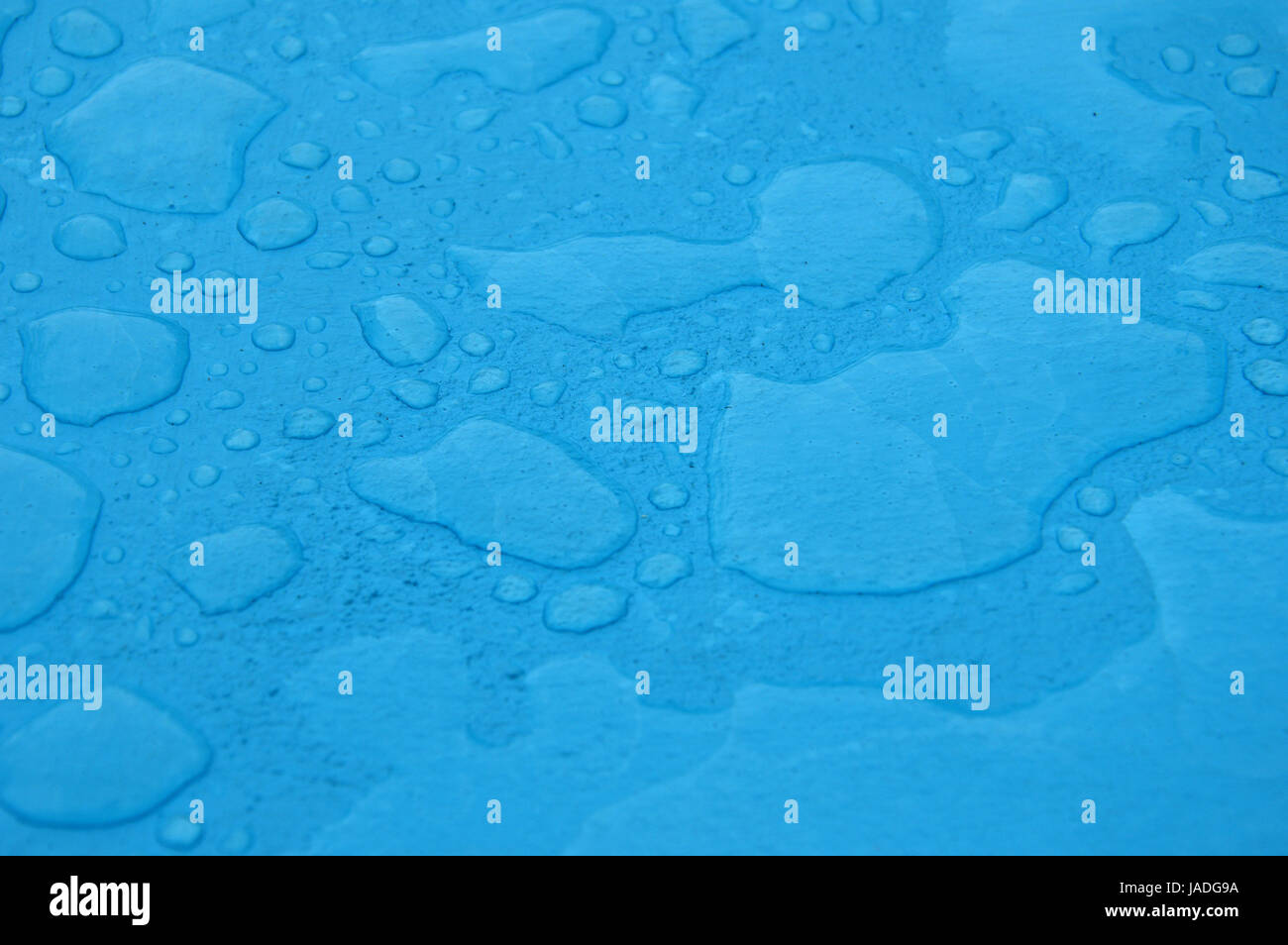 blue rain puddles Stock Photo Alamy