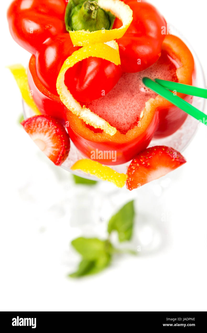 long coctail in red pepper with decoration and tubes Stock Photo