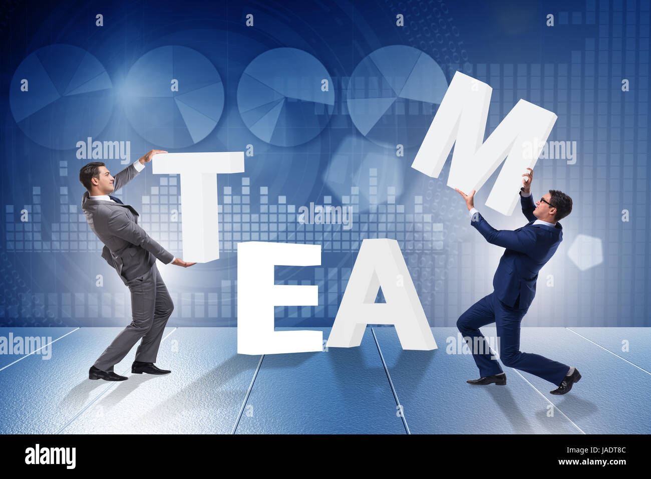 Teamwork concept with businessman putting letters Stock Photo - Alamy