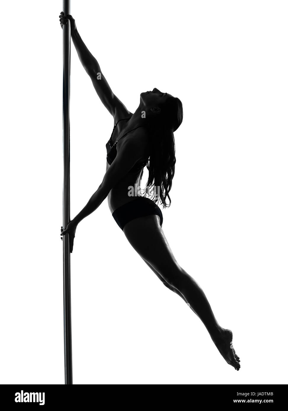one caucasian woman pole dancer dancing in silhouette studio isolated on white background Stock Photo