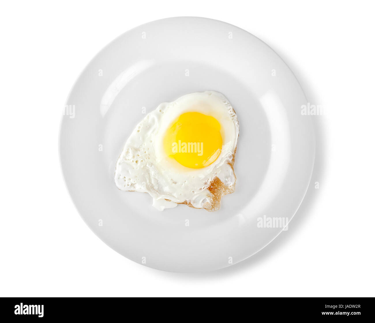 Fried egg on a plate isolated on white background (Path Stock Photo - Alamy