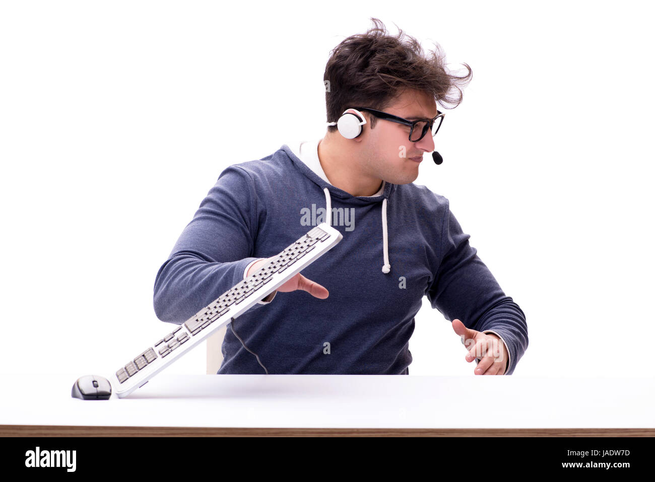 Funny nerd man working on computer isolated on white Stock Photo