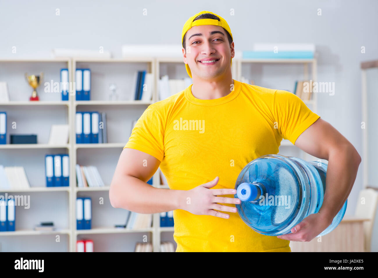 Man carrying water jug hires stock photography and images Alamy