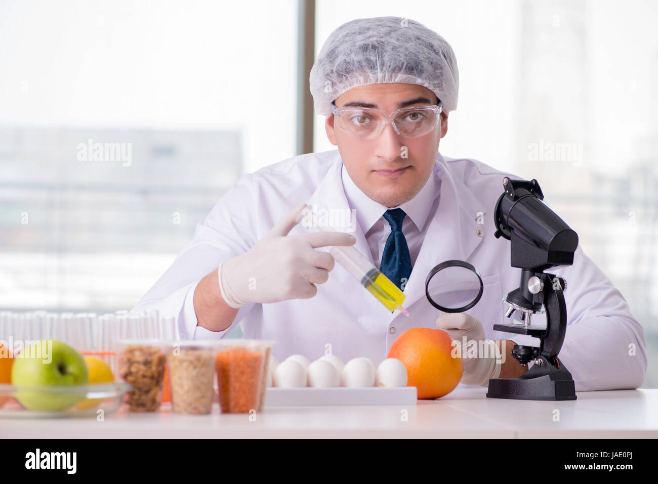 Nutrition expert testing food products in lab Stock Photo Alamy