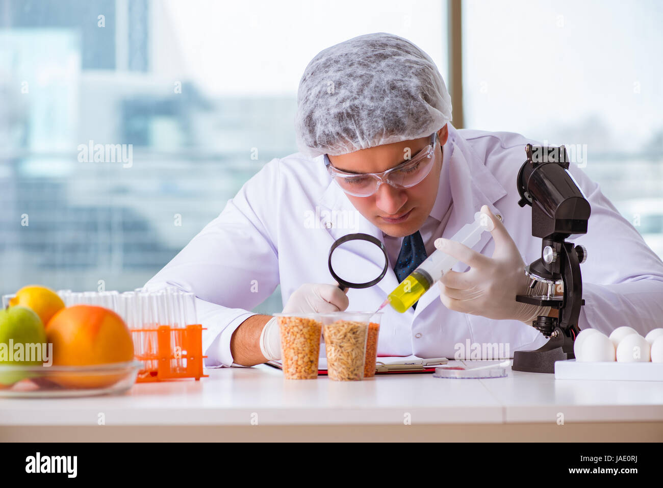 Nutrition expert testing food products in lab Stock Photo Alamy