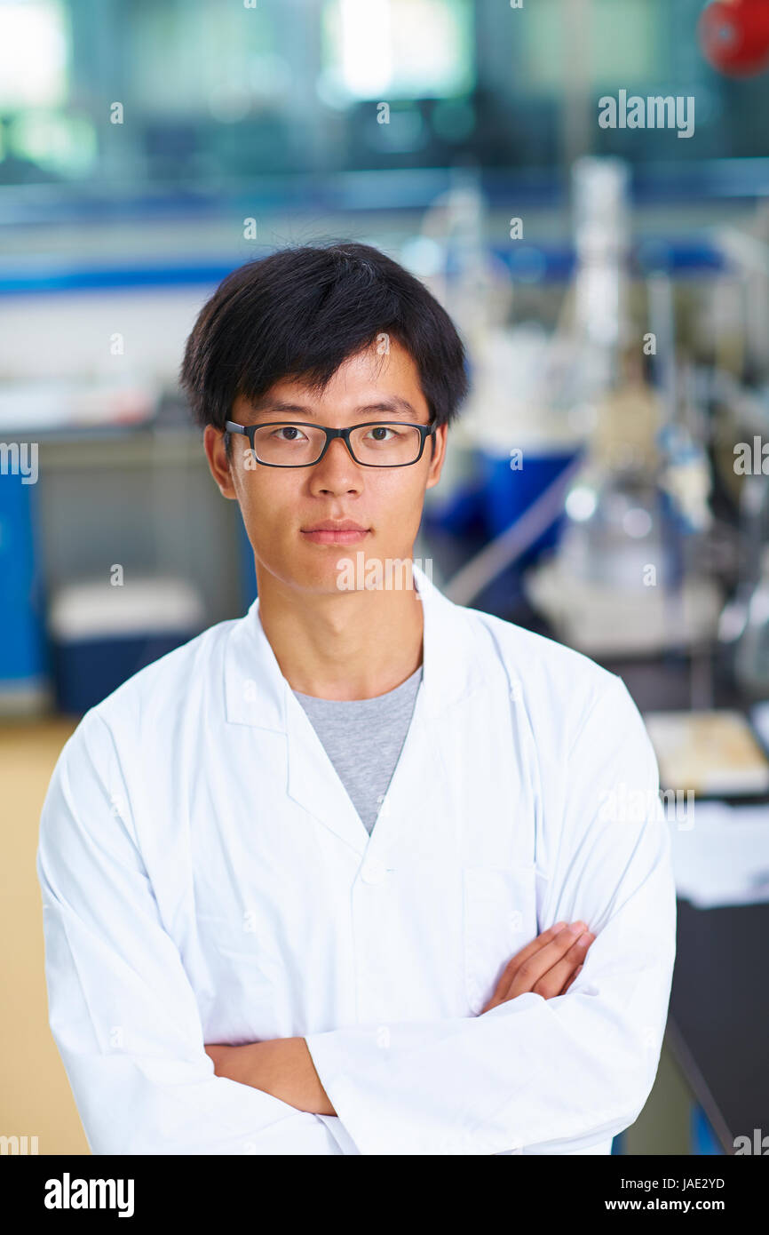 One male Chinese Laboratory scientist working at lab with test tubes Stock Photo