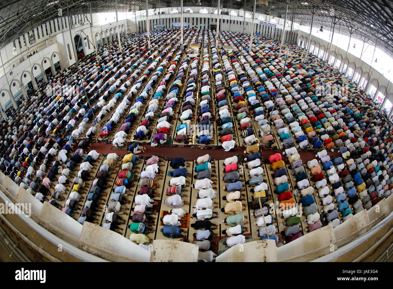 Devotees offer the Jummah prayers at the Baitul Mukarram National Mosque in Dhaka on the first Friday of the month of Ramadan. Dhaka, Bangladesh Stock Photo