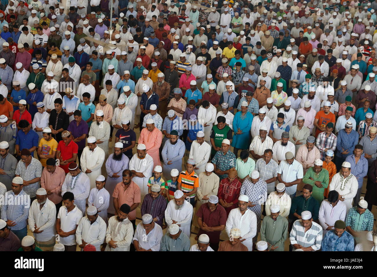 Devotees offer the Jummah prayers at the Baitul Mukarram National Mosque in Dhaka on the first Friday of the month of Ramadan. Dhaka, Bangladesh Stock Photo