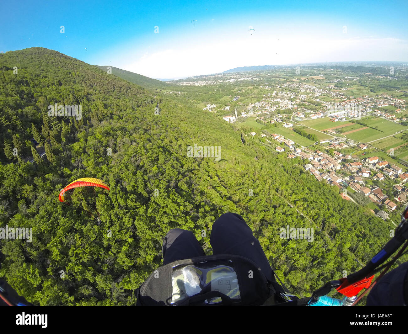 Paragliders taking off from mountain Stock Photo