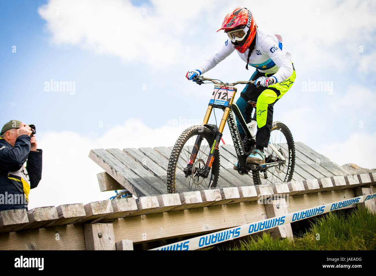 Eleonora Farina of Italy navigates the boardwalk on the UCI Mountain Bike World Cup course at Fort William on June, 4, 2017. Stock Photo