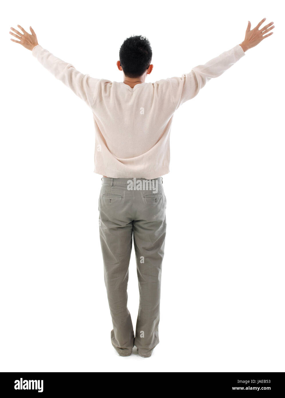 Strong man. Handsome young shirtless man keeping arms raised and looking at  camera while standing against grey background 13291616 Stock Photo at  Vecteezy