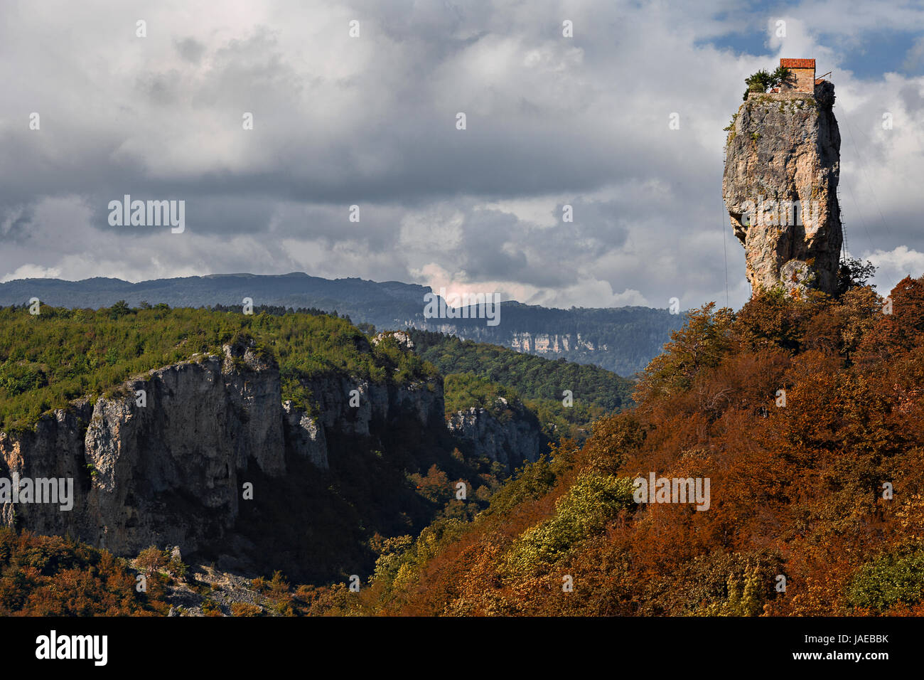 Monolithic rock formation known as Katskhi Pillar with a monk's cell on the top, in Georgia. Stock Photo