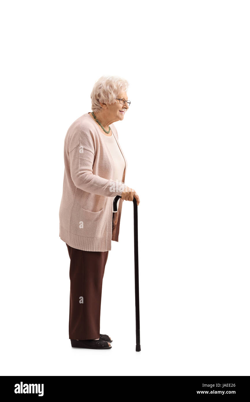 Full length profile shot of a mature woman with a cane waiting in line isolated on white background Stock Photo