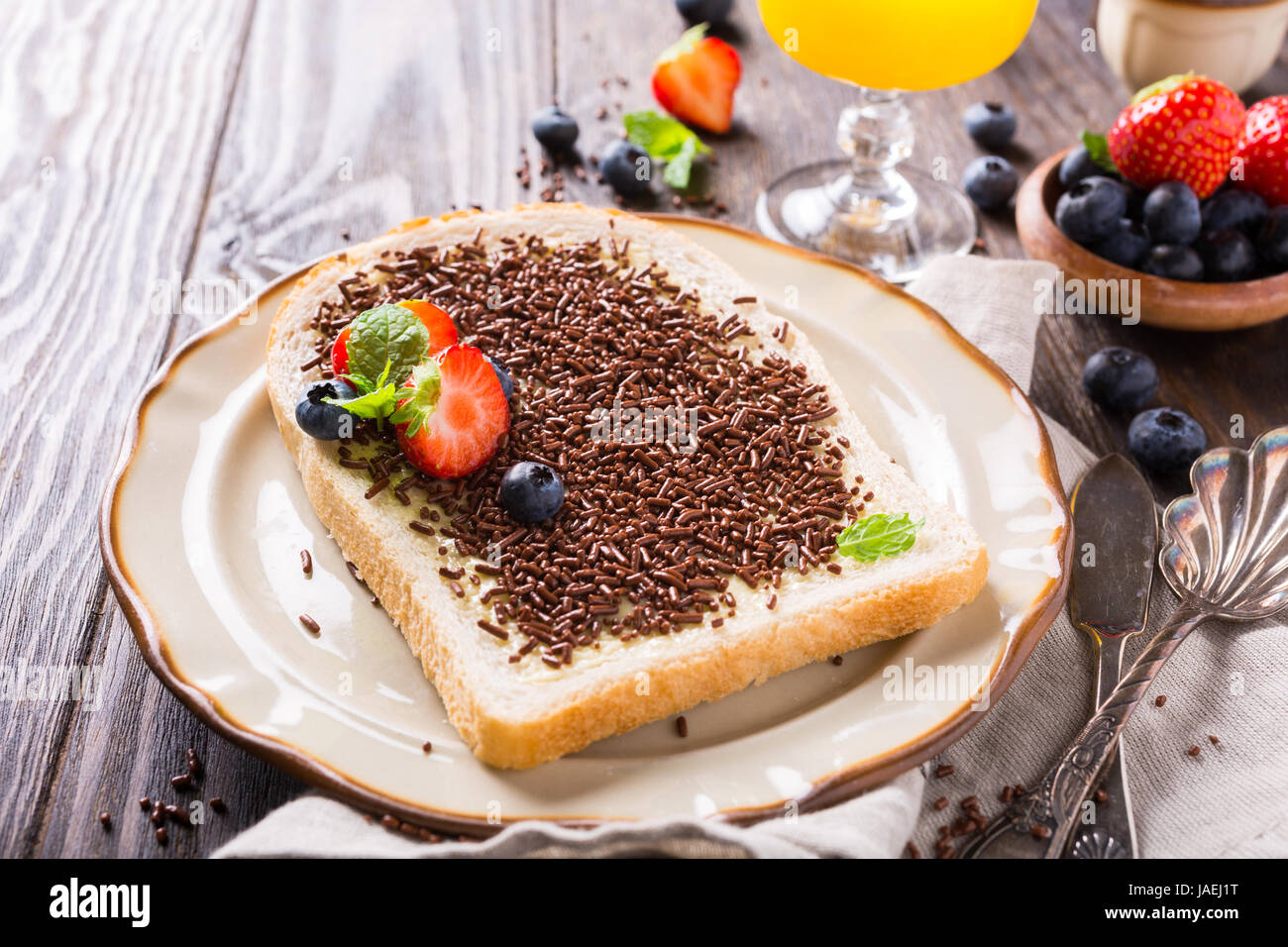 Dutch breakfast, slice of bread with hagelslag chocolate sprinkles and