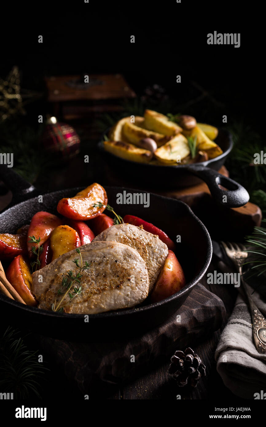 Roasted pork steak with caramelized apples Stock Photo Alamy
