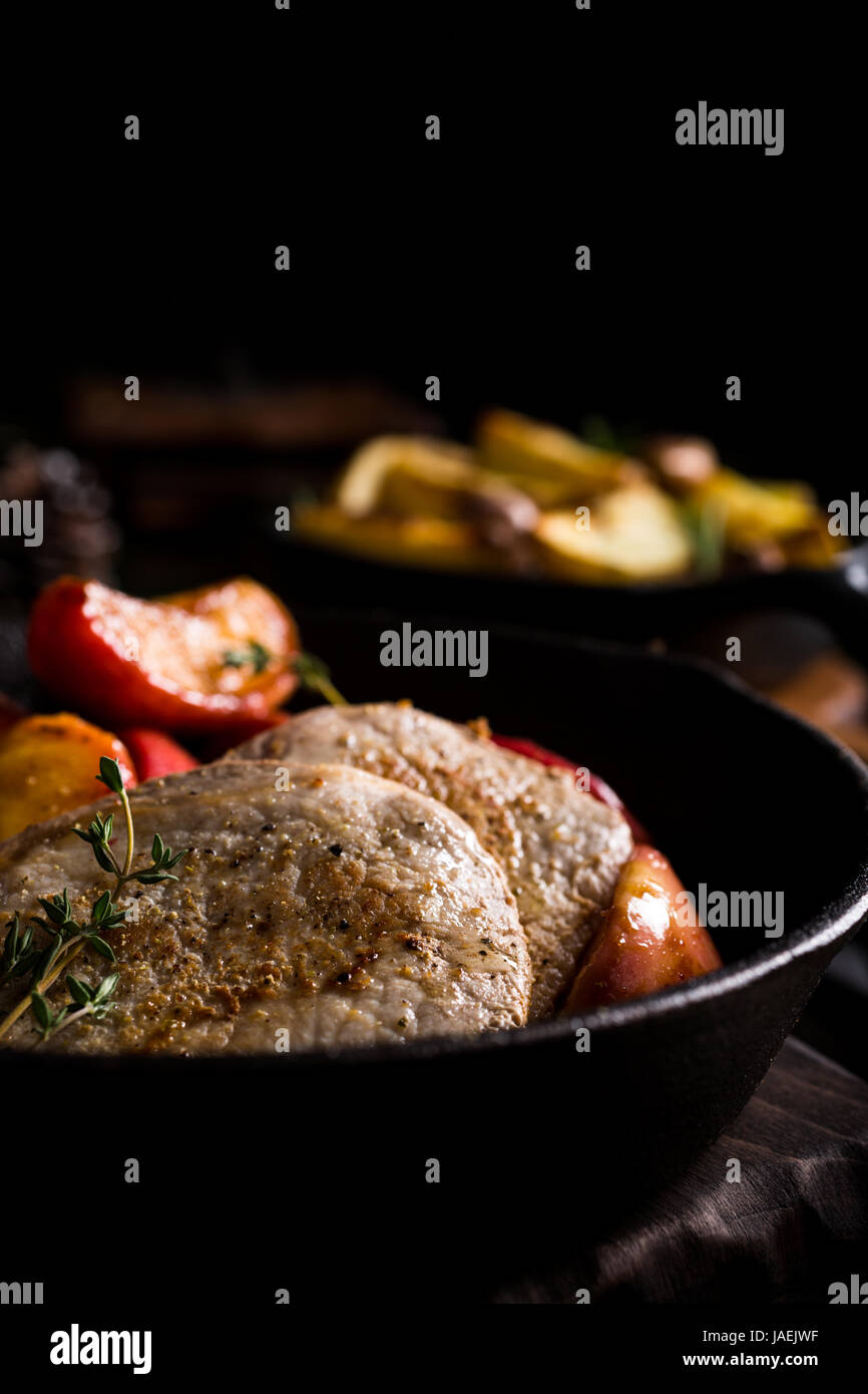 Roasted pork steak with caramelized apples Stock Photo Alamy