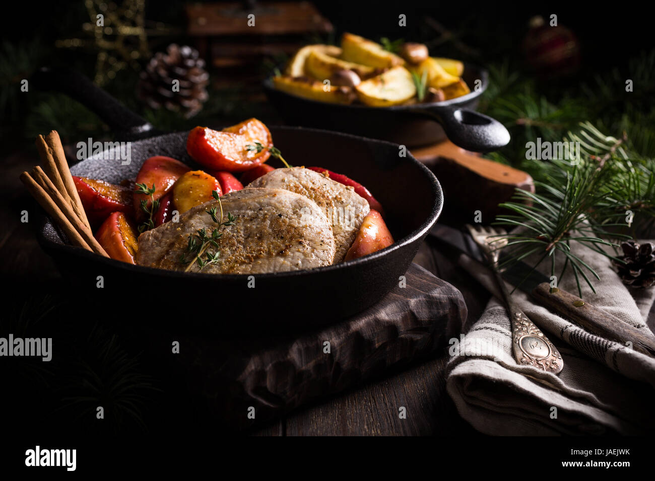 Roasted pork steak with caramelized apples Stock Photo Alamy