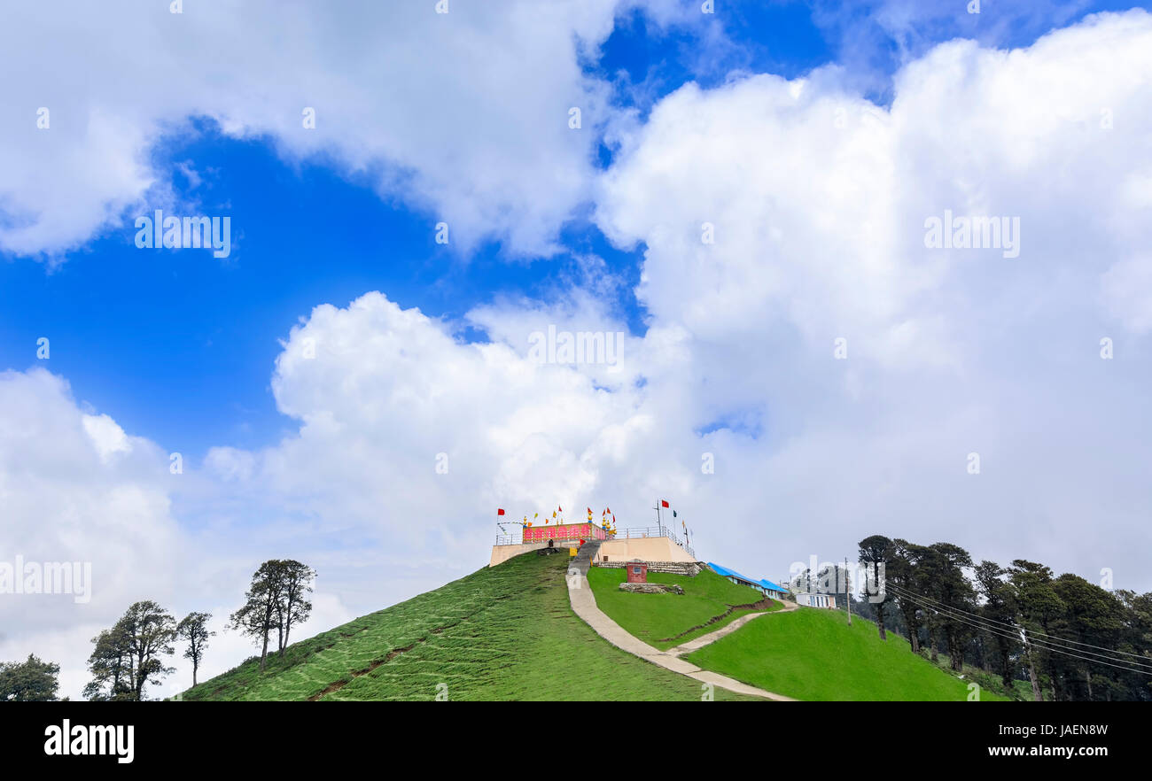 Glorious view of roofless shrine of Shikari Mata Temple (The Hunter Goddess) at a height of 2850 meters above sea level near Janjehli valley, Himachal Stock Photo