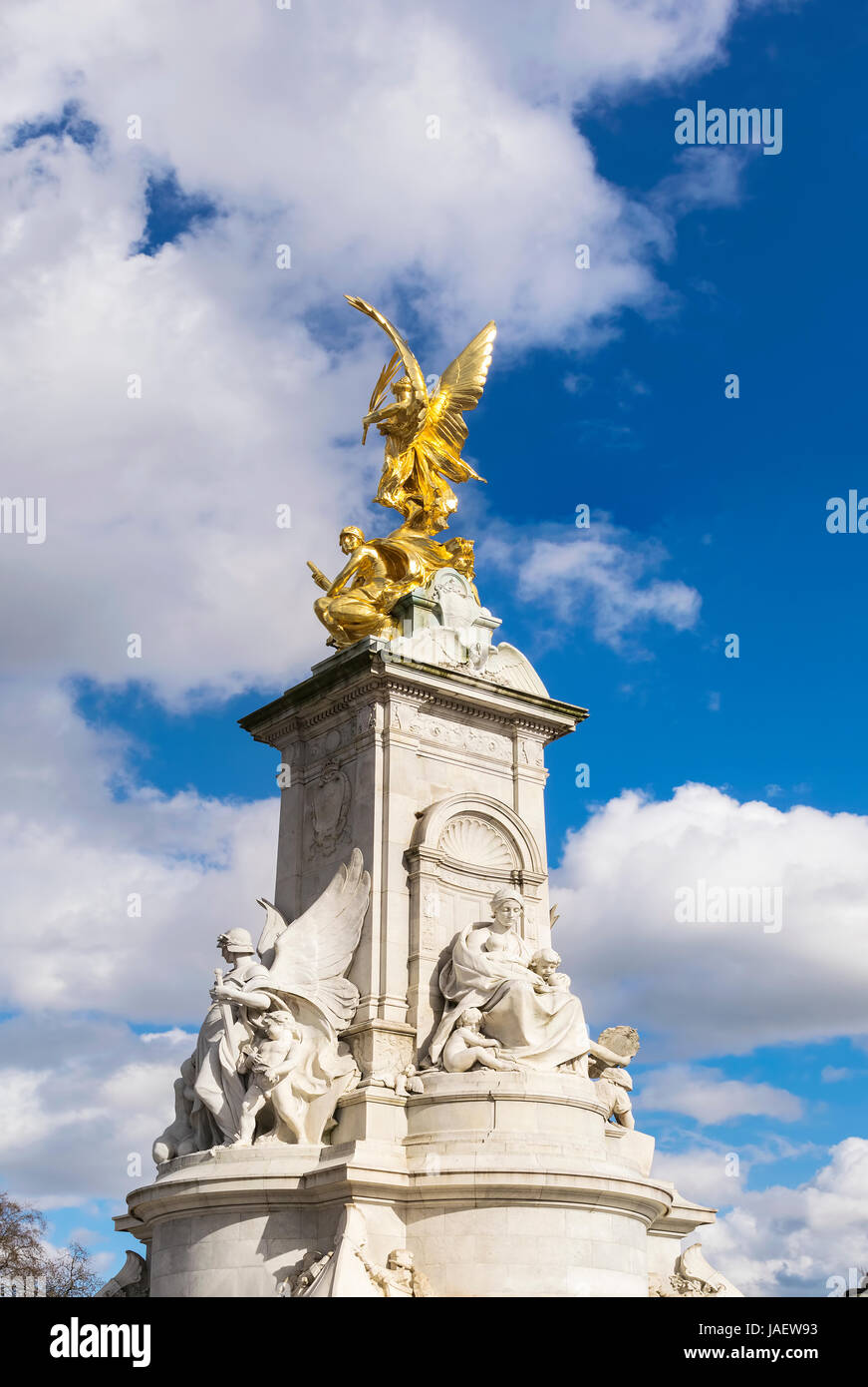 The Statue of Queen Victoria Memorial is a monument located in front of the Buckingham Palace in London. The central pylon of the memorial is of Pente Stock Photo