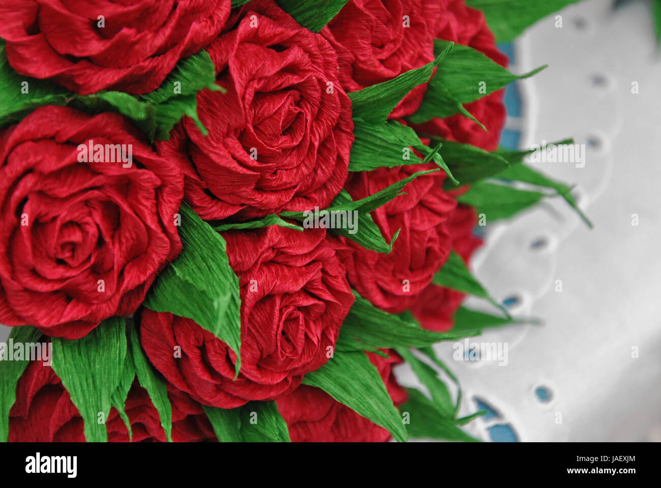 A close up photograph of handmade tissue paper rose bouquet Stock Photo