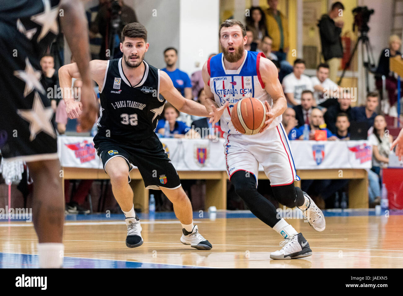 May 26, 2017: Nandor Kuti #32 of U BT Cluj-Napoca L and Marius Runkauskas  #22 of Steaua CSM EximBank Bucharest R during the LNBM - Men's National  Basketball League - FINAL -