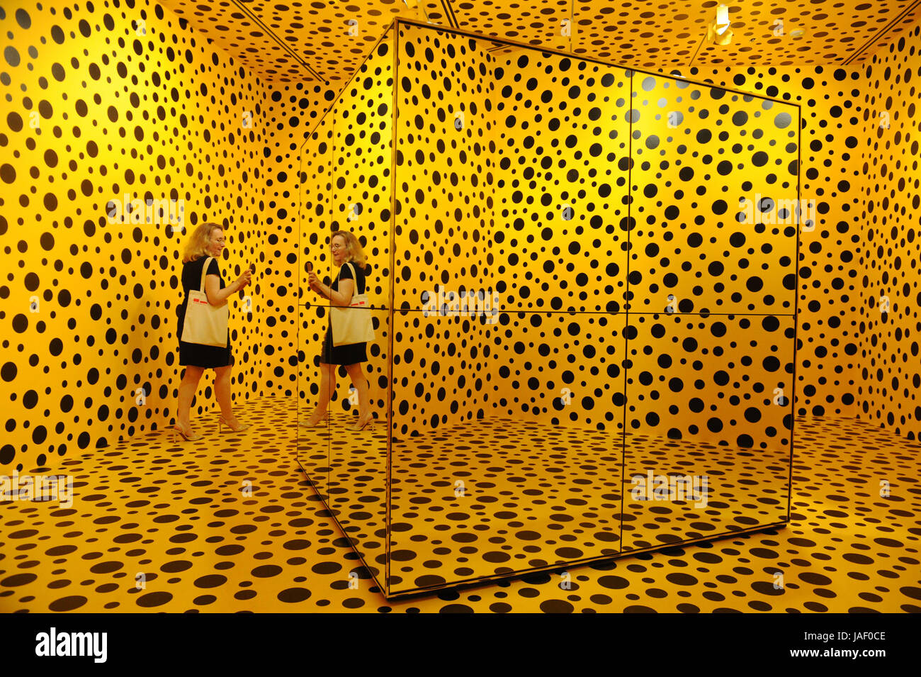 Singapore. 6th June, 2017. A visitor views an artwork of Japanese artist Yayoi Kusama in National Gallery Singapore, on June 6, 2017. The exhibition 'Yayoi Kusama: Life is the Heart of a Rainbow' will open to the public from June 9 to Sept. 3. Credit: Then Chih Wey/Xinhua/Alamy Live News Stock Photo