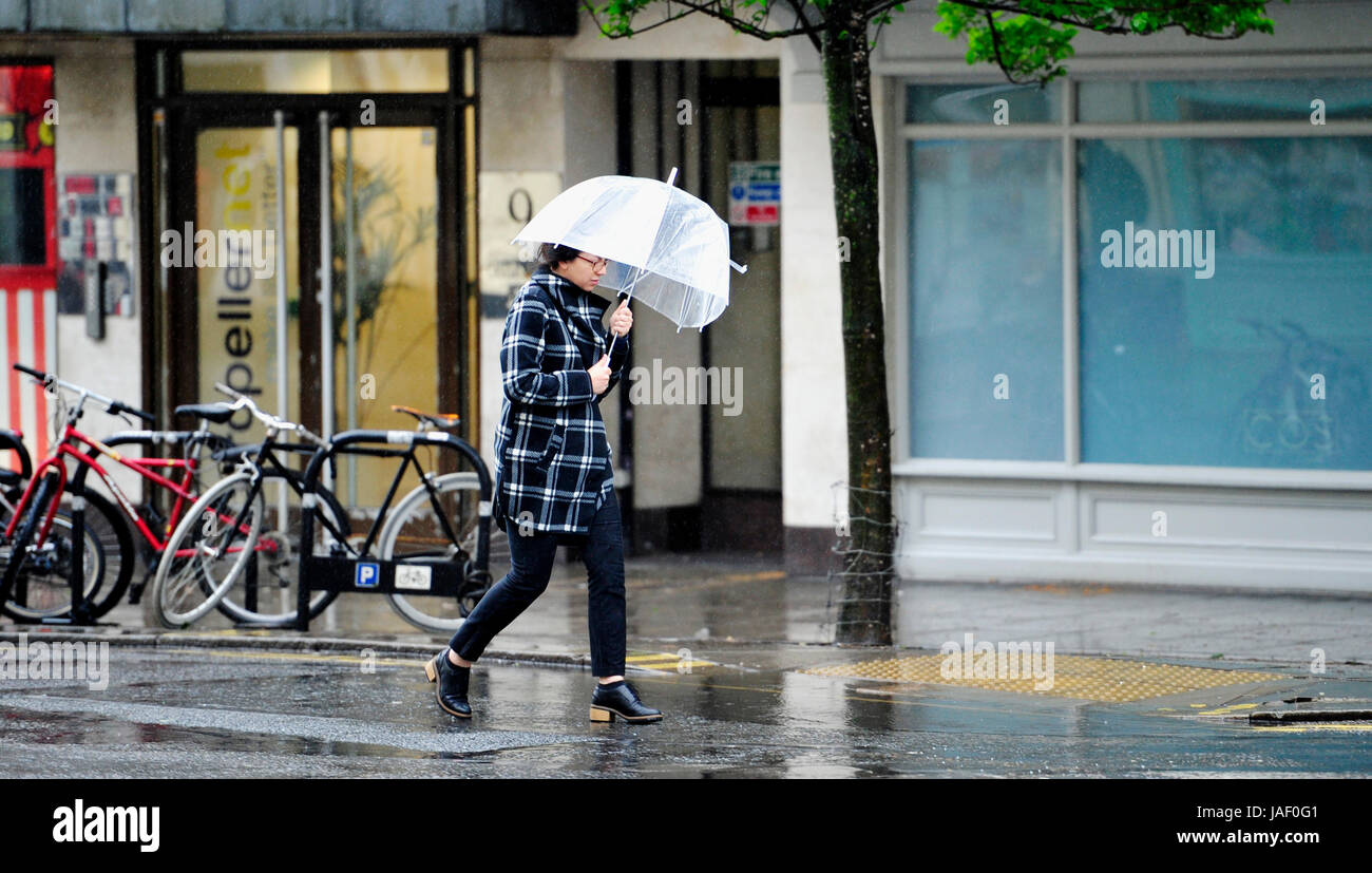 Strong wind umbrella hi-res stock photography and images - Alamy