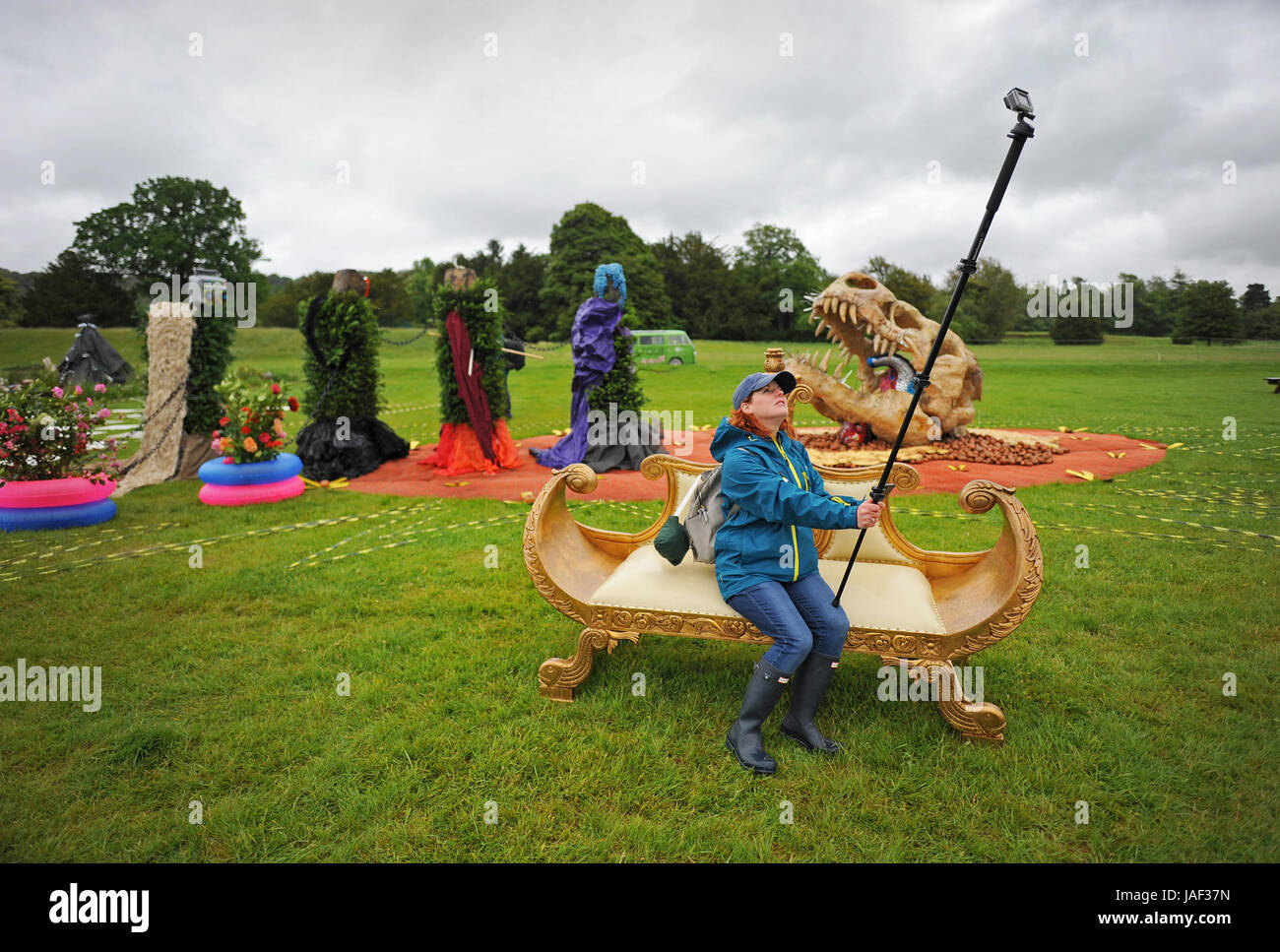Chatsworth, Derbyshire, UK. 6th June, 2017. 6th June 2017. Chatsworth Royal Horticultural Society Flower Show. Picture shows Tracy Burfield stops to take a selfie on one of the display gardens at the Chatsworth RHS Flower Show at Chatsworth House in Derbyshire. Credit: Howard Walker/Alamy Live News Stock Photo