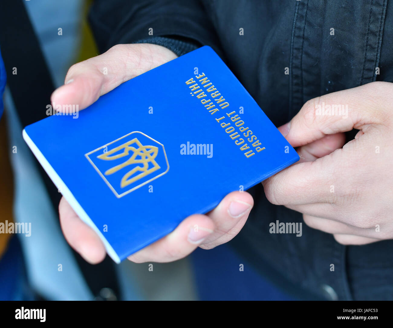 Au Pair Girl Hanna From The Ukraine Holds Her Passport In Her Hands Stock Photo Alamy