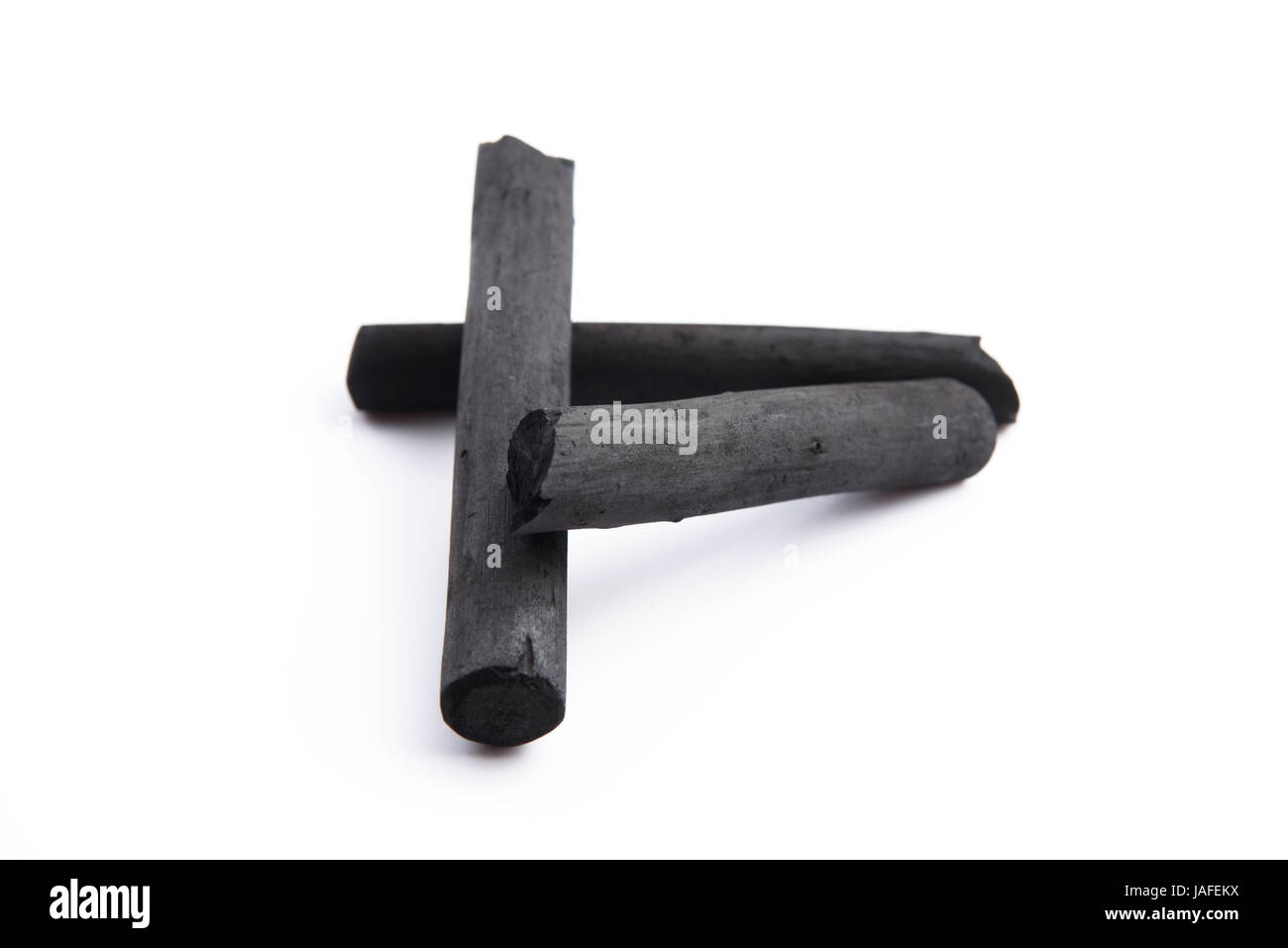 Artist's black charcoal with smudge Stock Photo - Alamy
