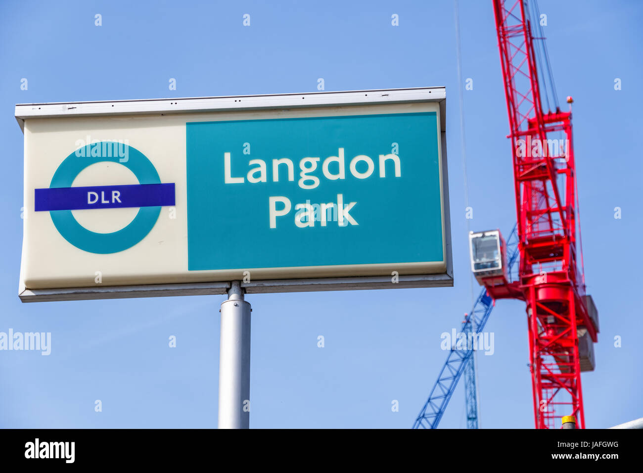 London, UK - March 27th, 2017 - Langdon Park sign with building cranes in the background Stock Photo