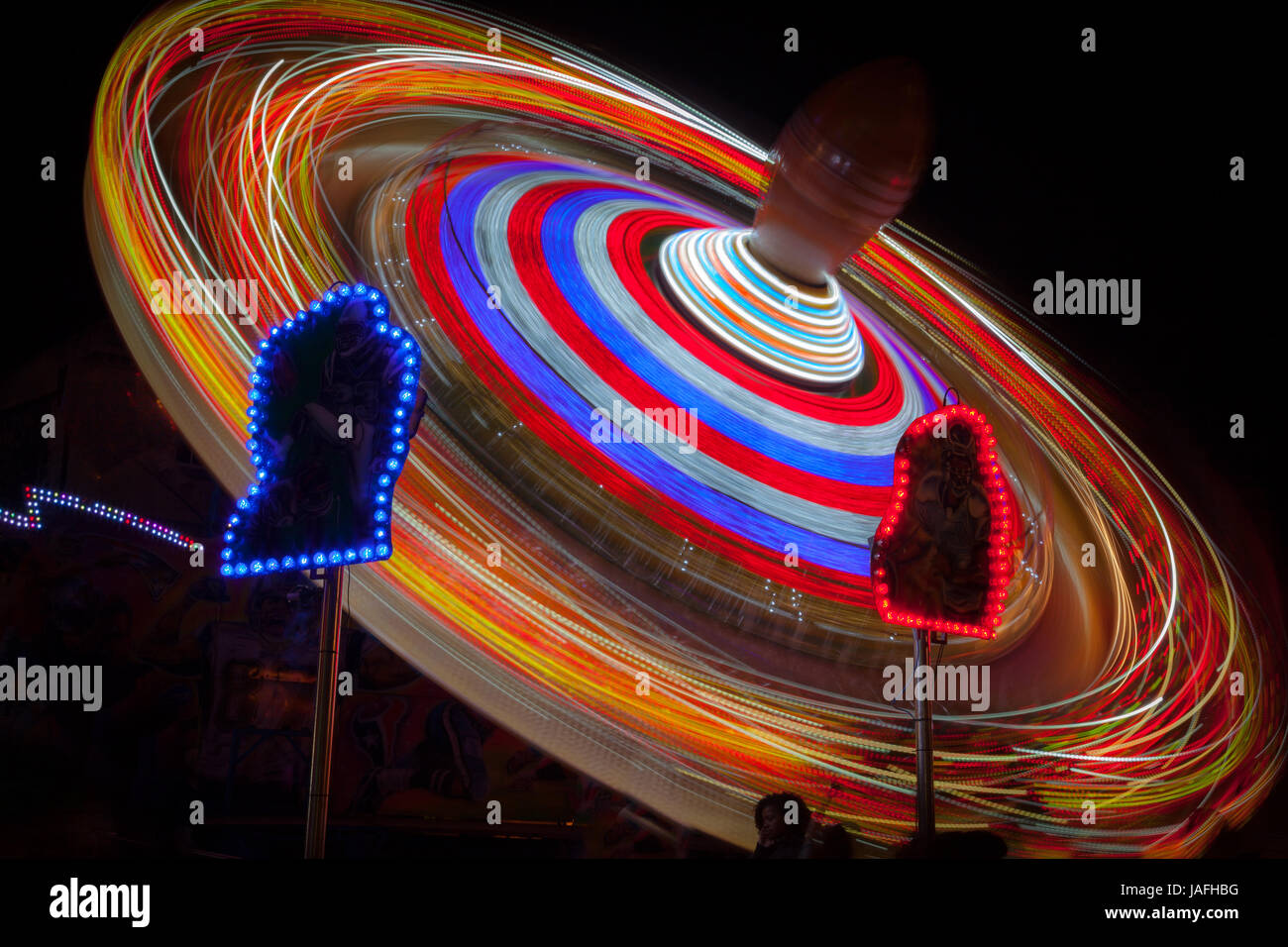 Spinning fair ground ride hi-res stock photography and images - Alamy