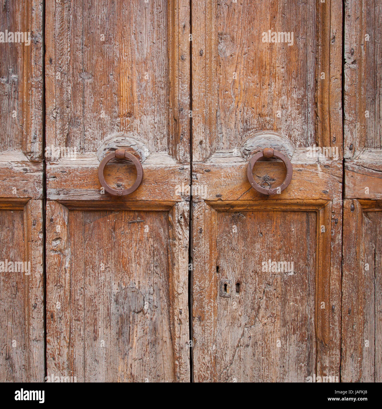 Decorative bronze door knob handle on wooden door Stock Photo Alamy
