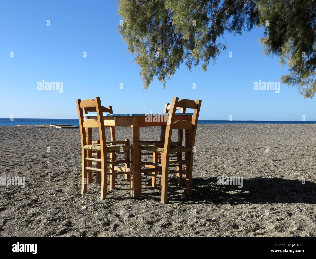 seating on the beach Stock Photo