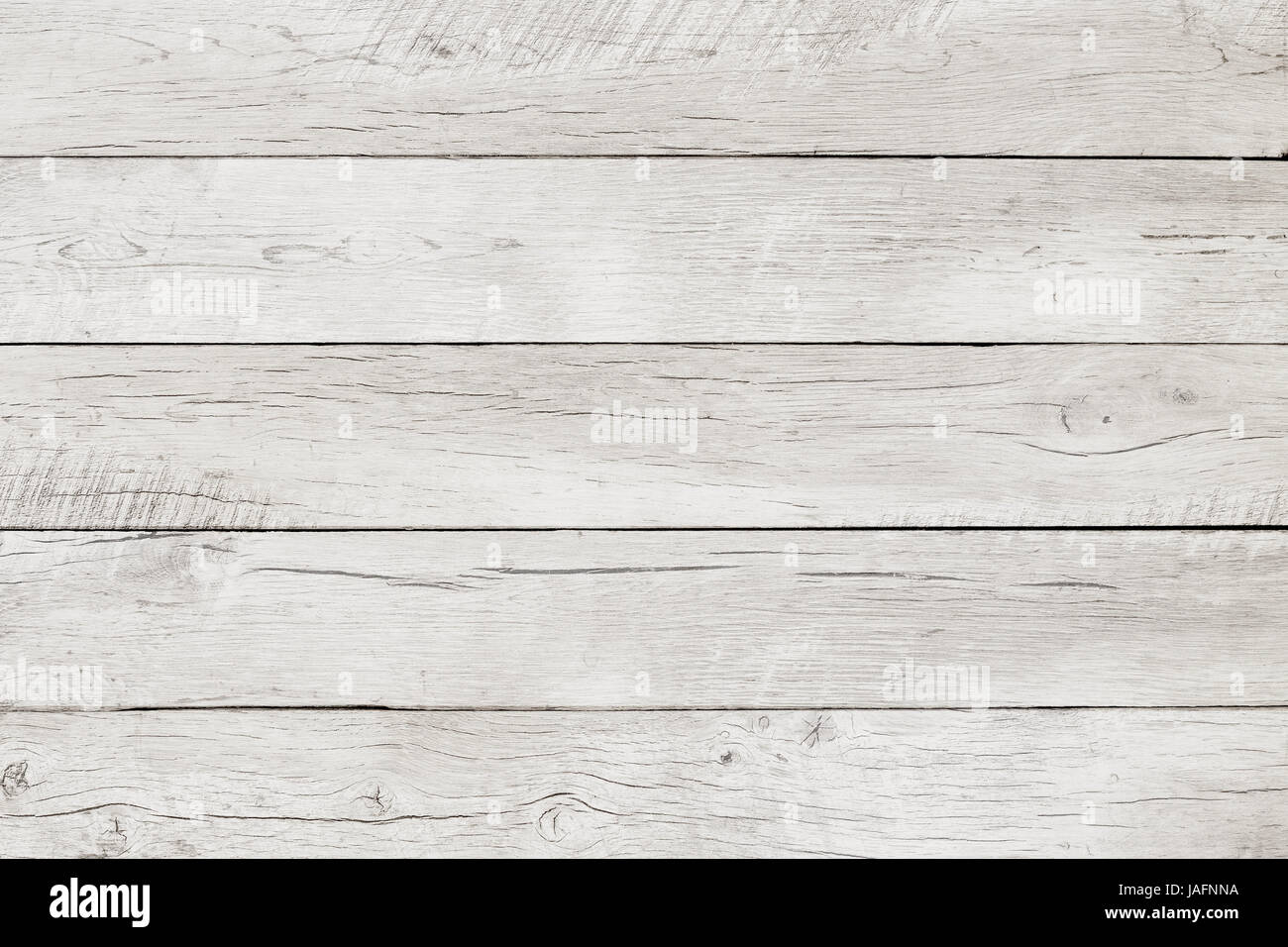 Old weathered wood surface with long boards lined up. Wooden planks on