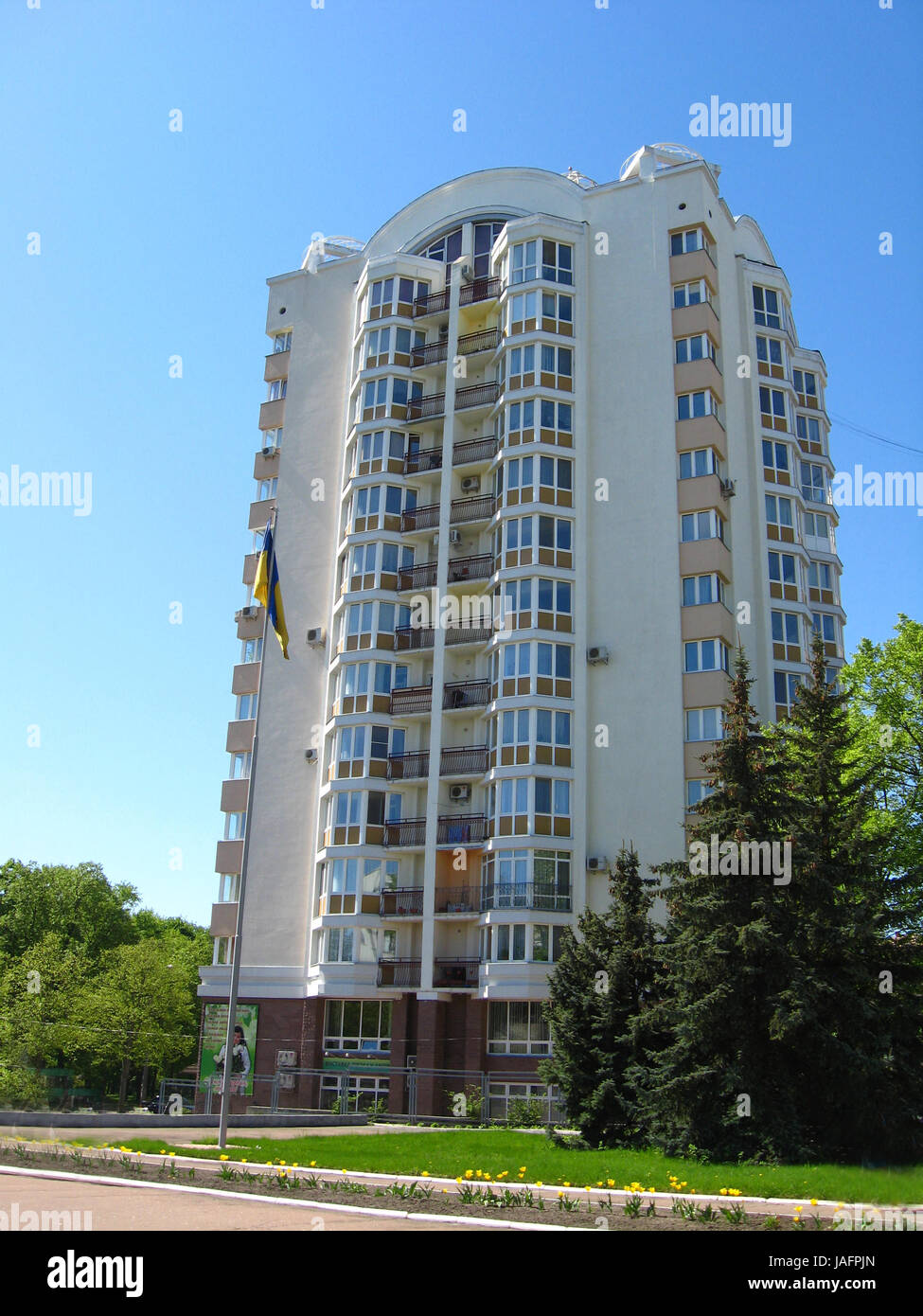 multistorey modern house on the blue sky background Stock Photo - Alamy