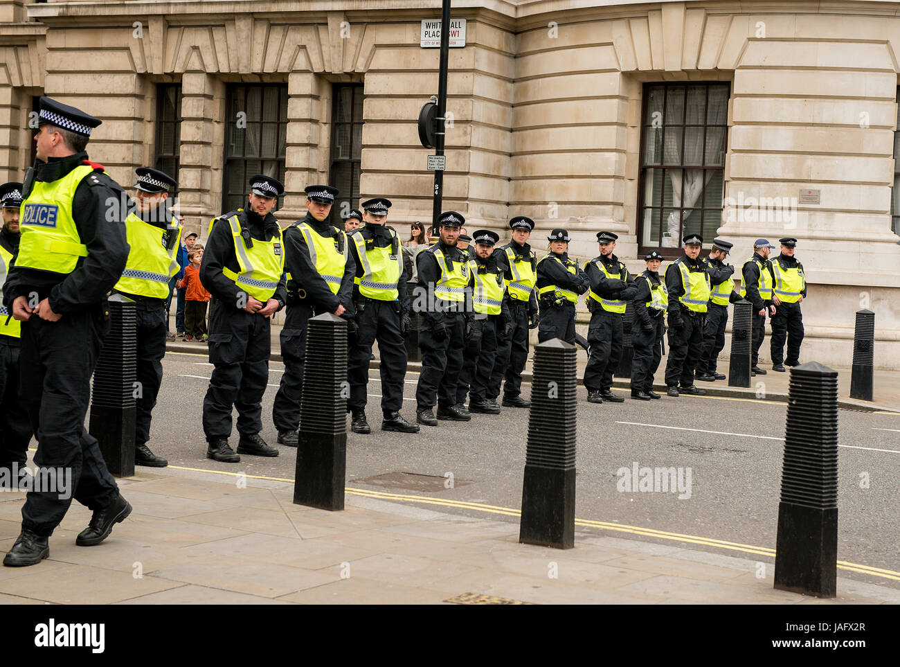 EDL / Britain First rally with counter demo by the Unite Against Fascism movement in central London. Police escorted the demos to keep law and order. Stock Photo