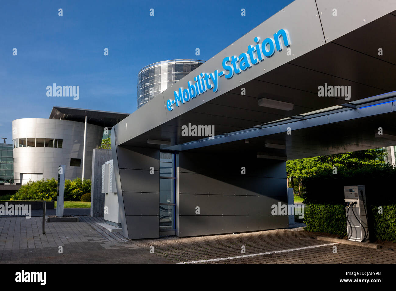 A view of the electric vehicle charging station in front of the 'Glaeserne Manufaktur', Transparent Factory in Dresden, Saxony, Germany, Europe Stock Photo
