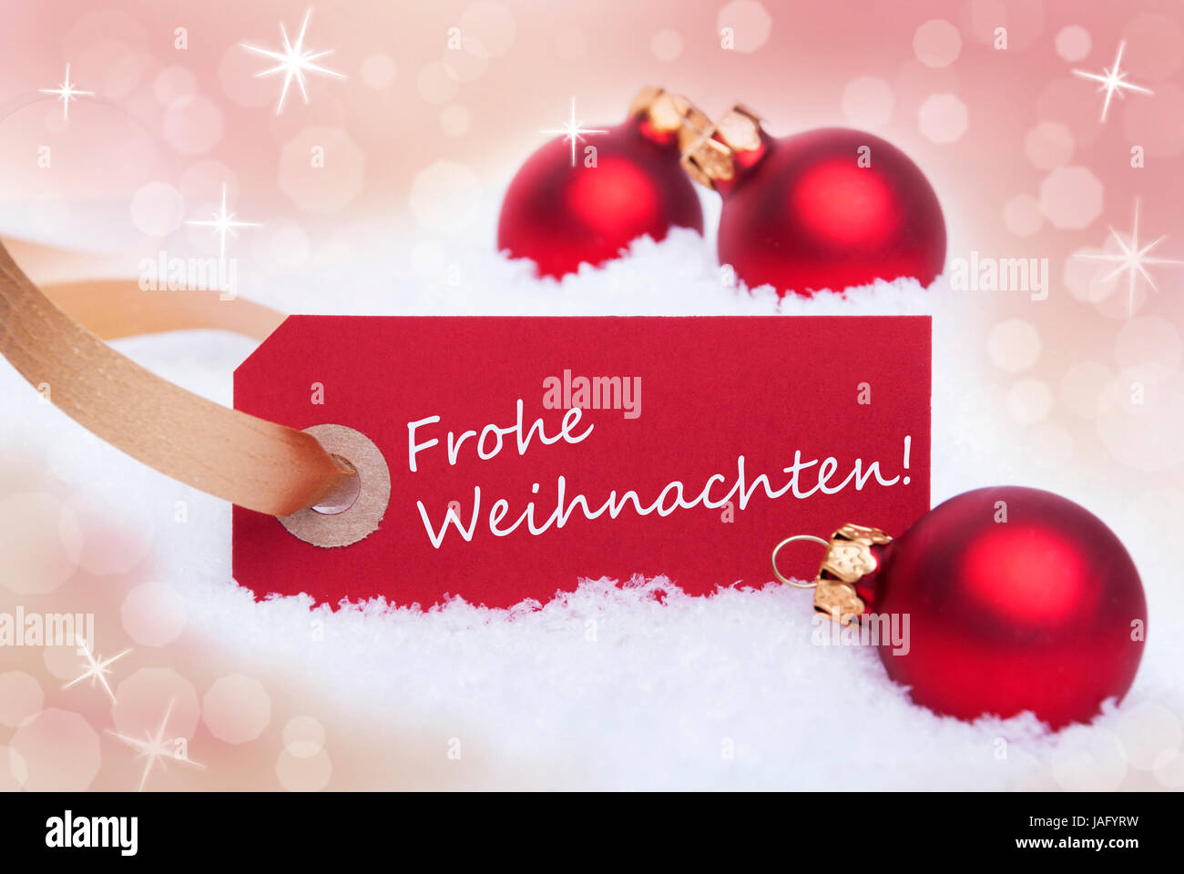 A Red Label With the German Words Frohe Weihnachten Which Means Merry Christmas Stock Photo