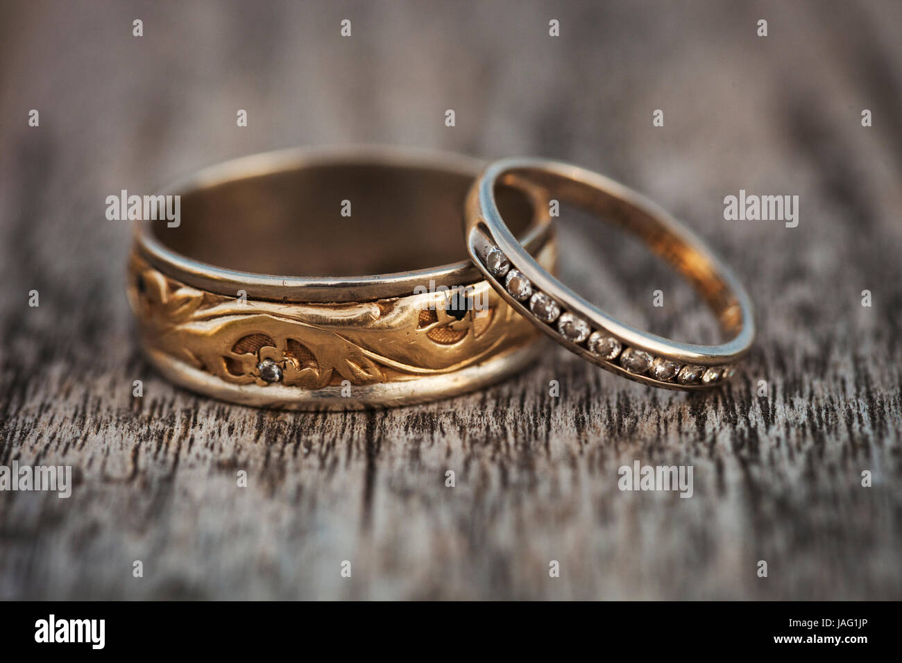 Close up of golden wedding bands Stock Photo Alamy