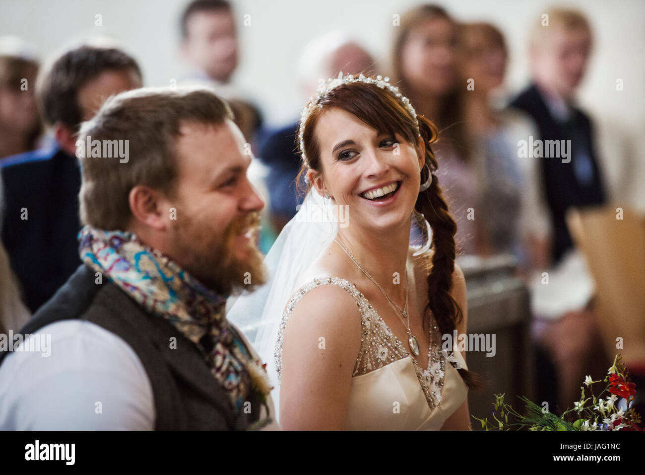 Bride looking into church hi-res stock photography and images - Alamy