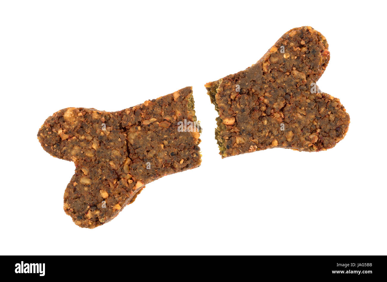 Top view of a beef pressed dog bone broken in half isolated on a white