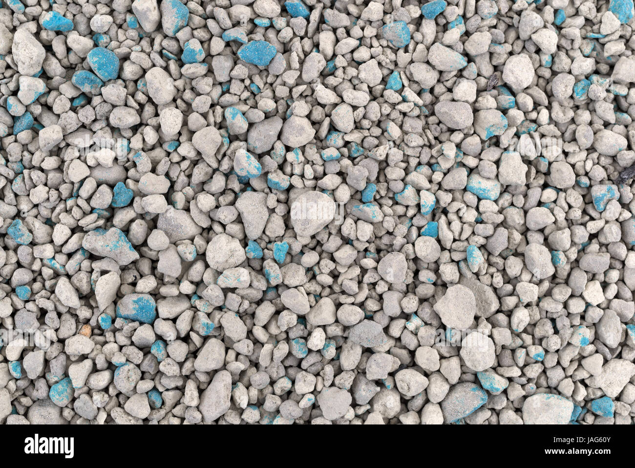 Very close view of a layer of ground clay cat litter. Stock Photo