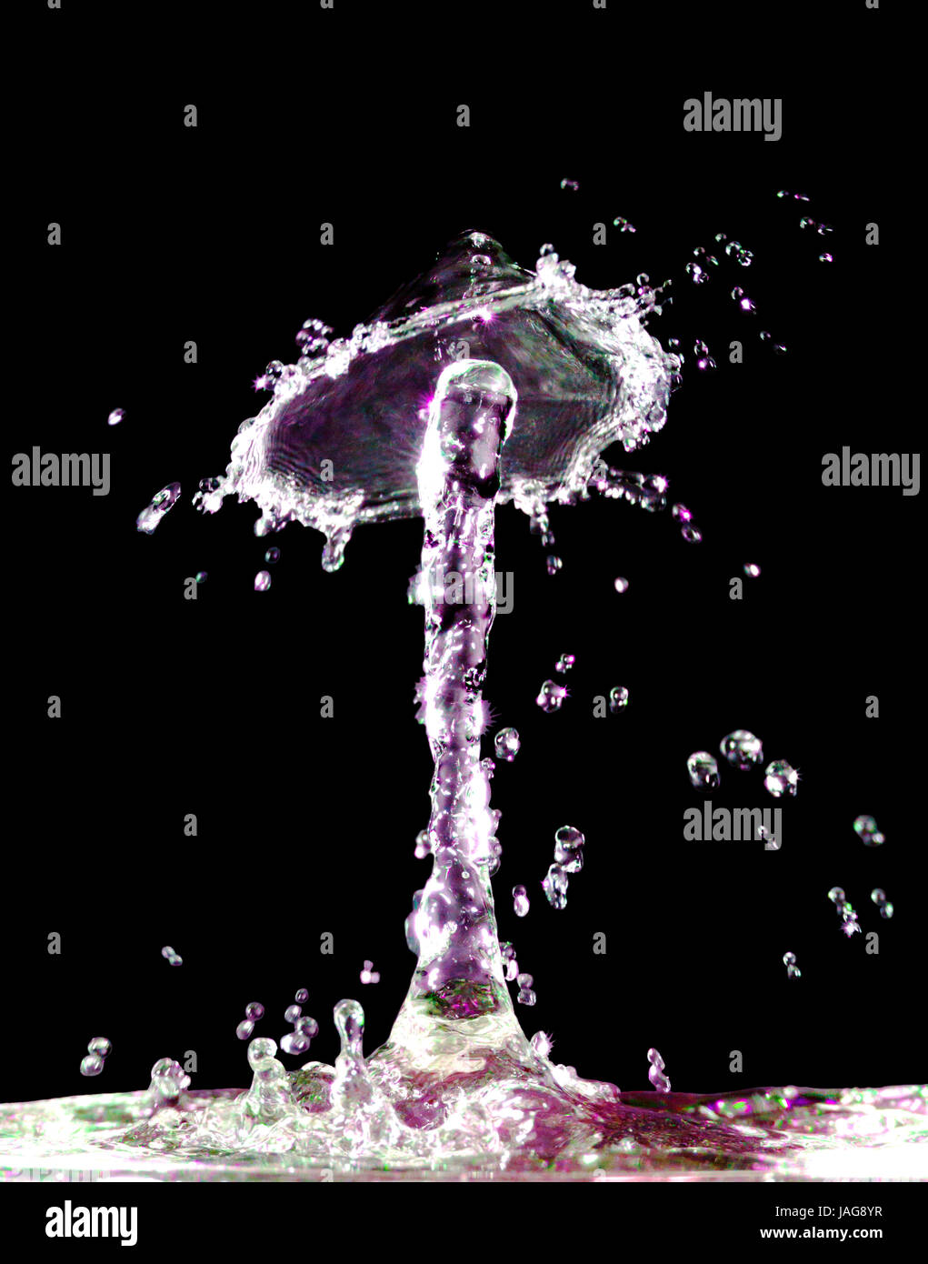 Colorful liquid splash isolated on black background closeup Stock Photo ...
