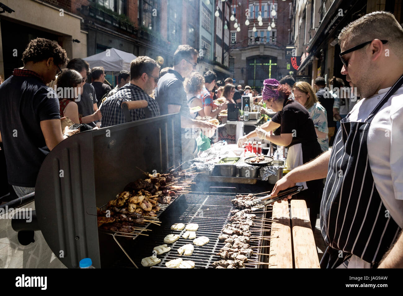 A street food festival in Carnaby Street London: “Carnaby Street Eat”. London street food London. Street food UK street food. Stock Photo
