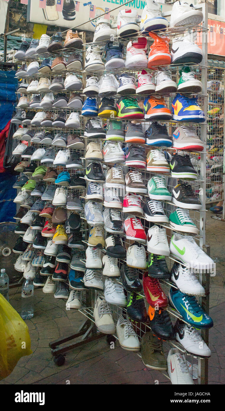 Trainers and sports shoes on diplay stand in Jalan Petalang open air