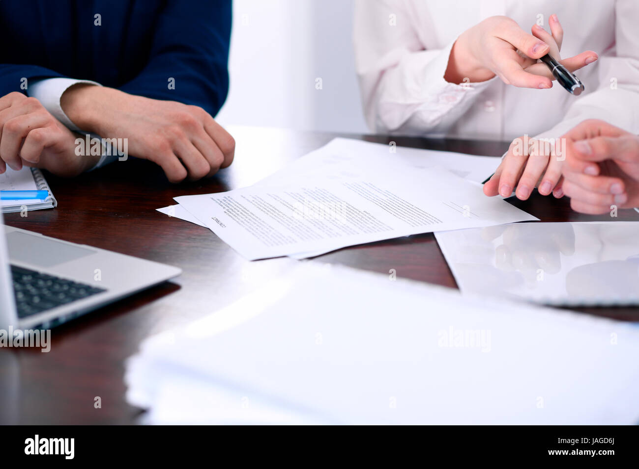 Business women giving a pen to business man for contract signing Stock ...