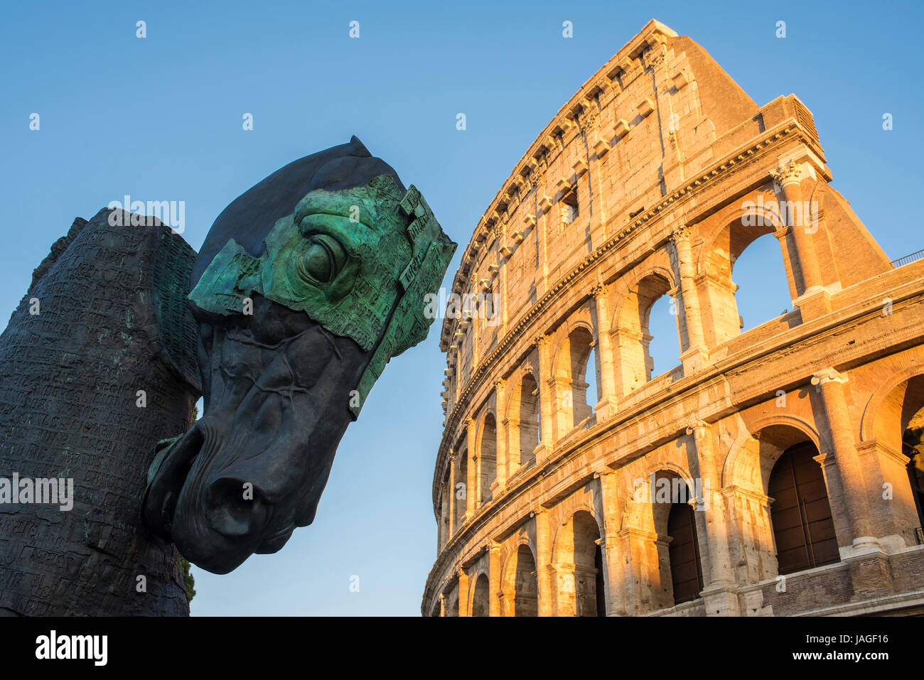 Horse sculpture 'Lapidarium - Waiting for the Barbarians' by Mexican artist Gustavo Aceves, next to the Colosseum in central Rome, Italy Stock Photo
