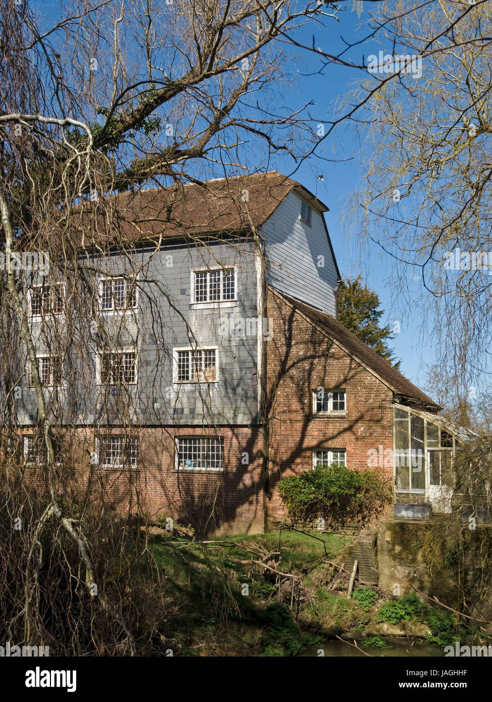 Old Hempstead Mill building with River Uck, Uckfield, East Sussex