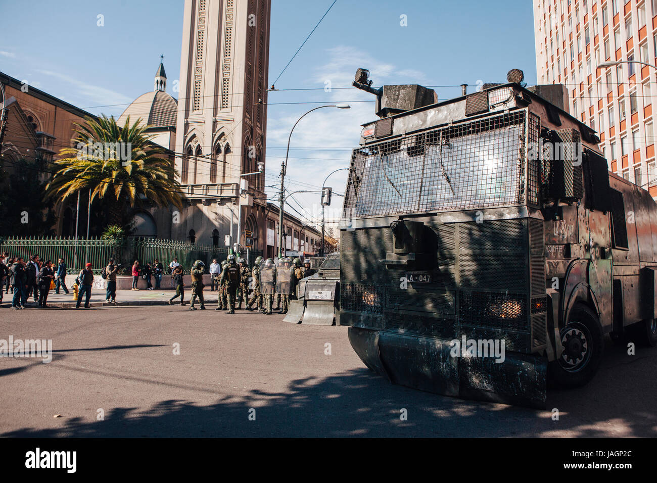 Valparaiso, Chile - June 01, 2017: Chilean riot police repress Protestants during a march on the streets of Valparaiso, following President Michelle B Stock Photo